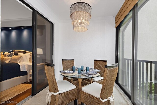 dining room featuring a wealth of natural light and a chandelier