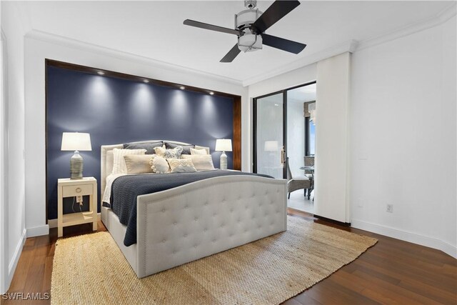 bedroom with wood finished floors, ornamental molding, access to outside, and baseboards