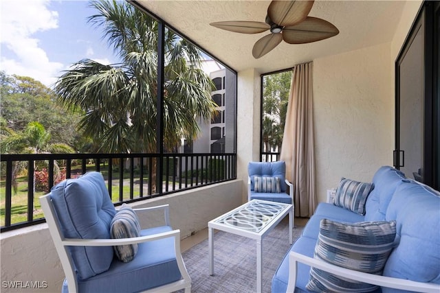 balcony featuring outdoor lounge area and a ceiling fan