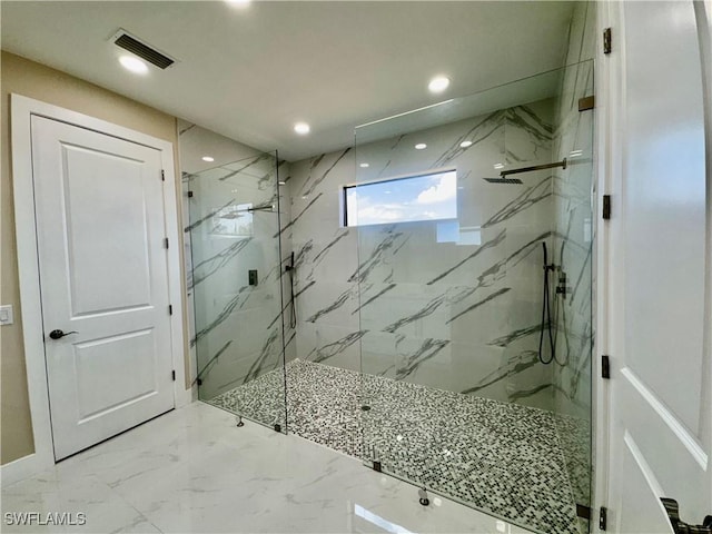 bathroom with marble finish floor, a marble finish shower, visible vents, and recessed lighting