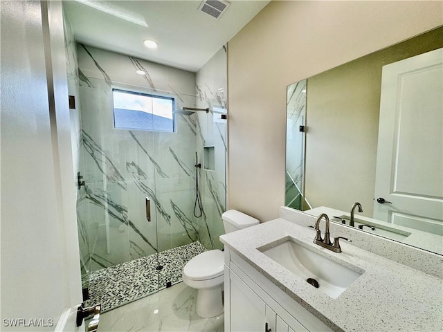 full bath with a marble finish shower, visible vents, toilet, marble finish floor, and vanity