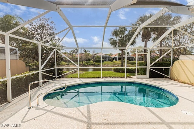 outdoor pool featuring a lanai and a patio