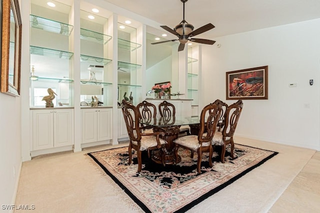 dining space with light carpet, recessed lighting, baseboards, and ceiling fan