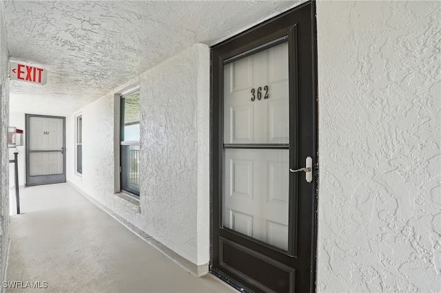 6891 Estero Blvd Unit 362, Fort Myers Beach, FL 33931 - doorway to property with stucco siding