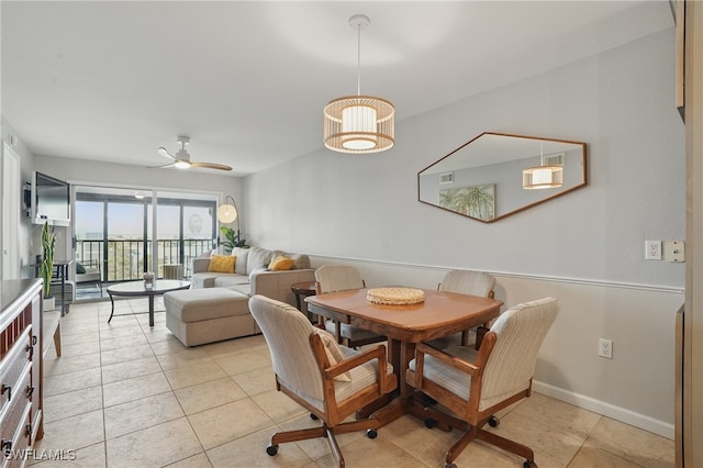 6891 Estero Blvd Unit 362, Fort Myers Beach, FL 33931 - dining space featuring light tile patterned floors, baseboards, and a ceiling fan