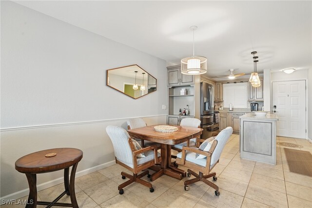 6891 Estero Blvd Unit 362, Fort Myers Beach, FL 33931 - dining room with baseboards and light tile patterned floors