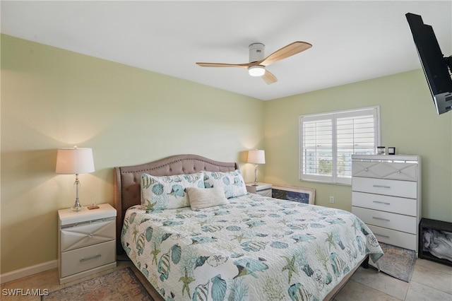 6891 Estero Blvd Unit 362, Fort Myers Beach, FL 33931 - bedroom with light tile patterned flooring, a ceiling fan, and baseboards