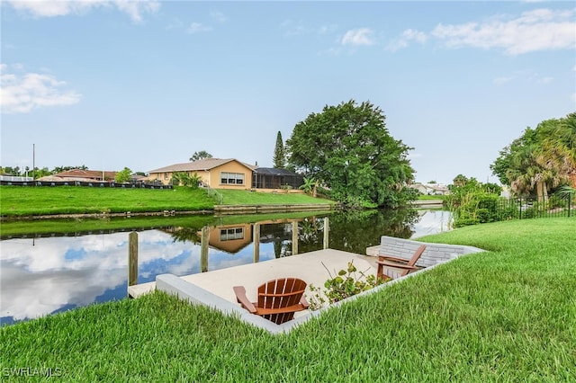 1702 SE 1st Ter, Cape Coral, FL 33990 - view of dock with a water view and a yard