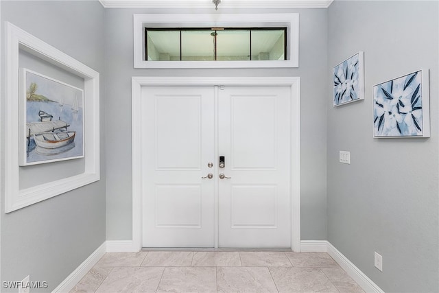 entrance foyer featuring baseboards