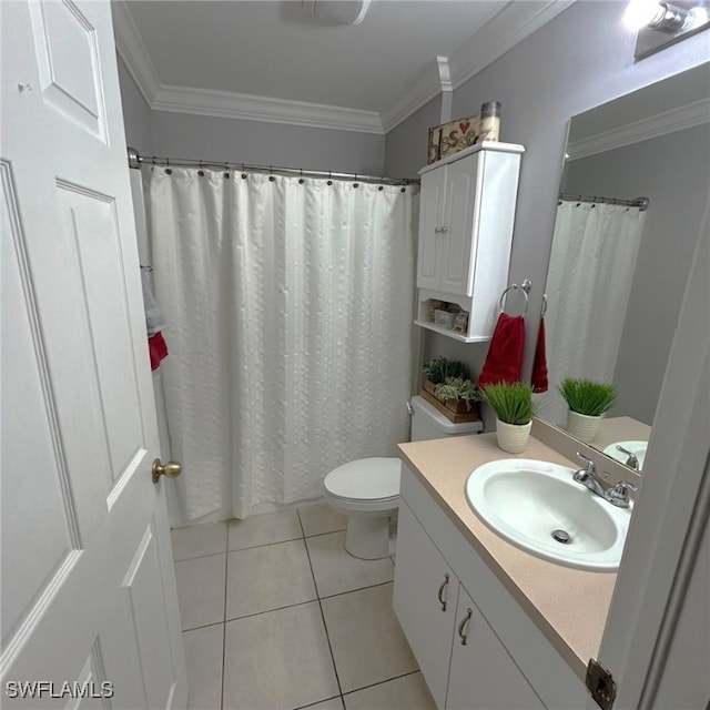 bathroom featuring toilet, a shower with shower curtain, vanity, ornamental molding, and tile patterned floors