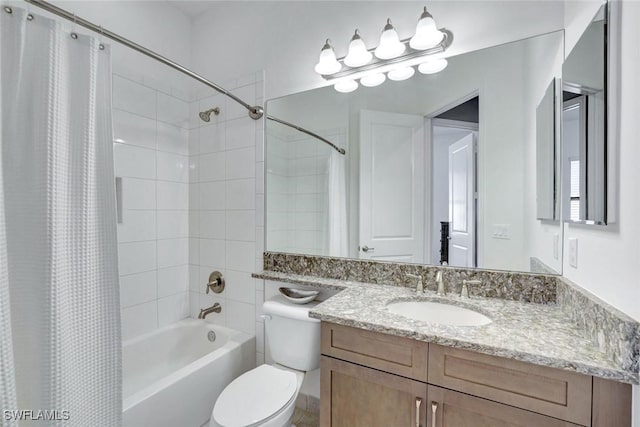 full bath with vanity, toilet, and shower / tub combo