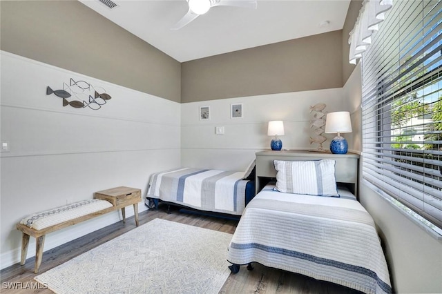 bedroom featuring wood finished floors and ceiling fan