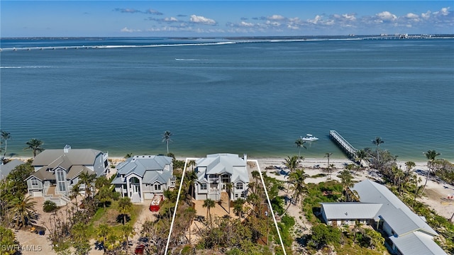 aerial view featuring a residential view and a water view