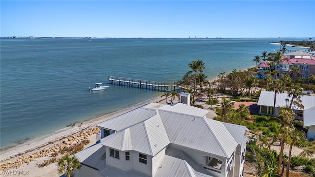 aerial view featuring a water view and a beach view