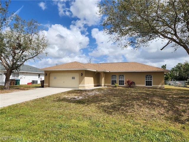 ranch-style home featuring a garage, driveway, a front lawn, and stucco siding