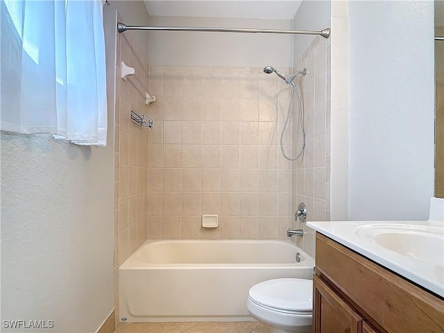 full bath featuring toilet, tile patterned floors, bathtub / shower combination, and vanity