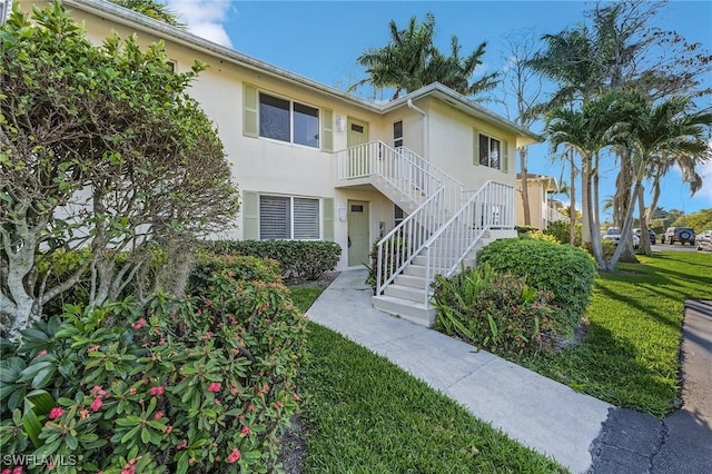 view of property with stairway