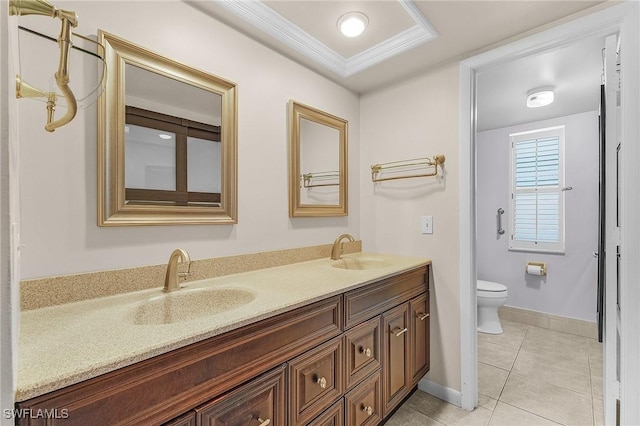 bathroom featuring a sink, toilet, double vanity, and tile patterned floors