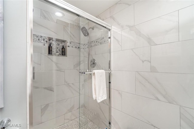 full bath featuring a stall shower