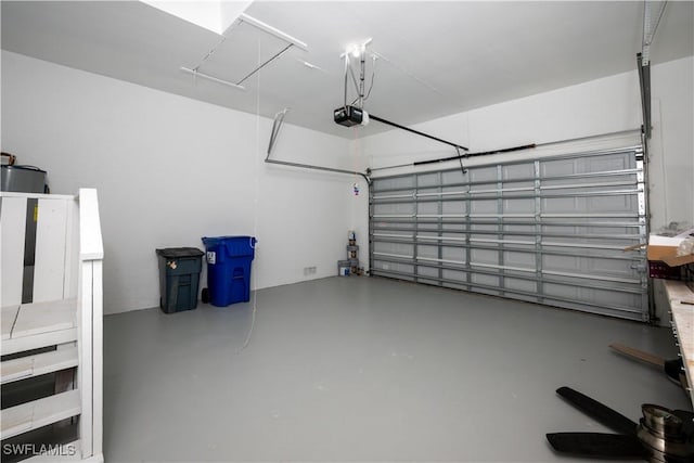 garage featuring a garage door opener