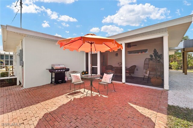 view of patio featuring a grill