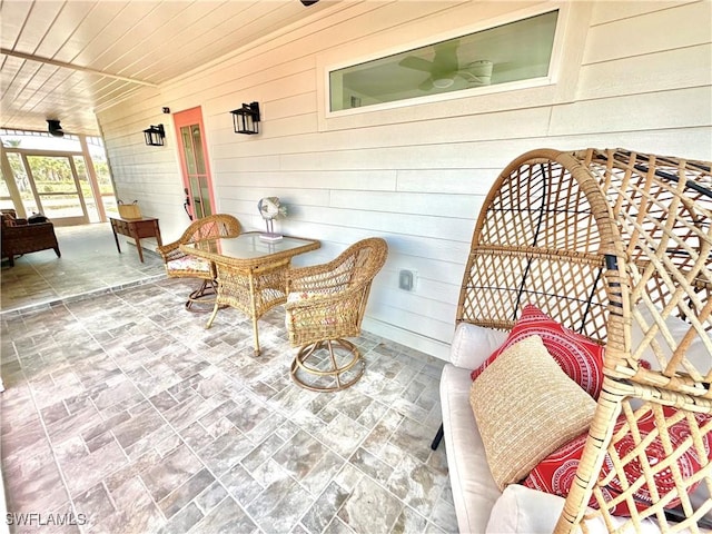 view of patio / terrace with a ceiling fan and outdoor lounge area