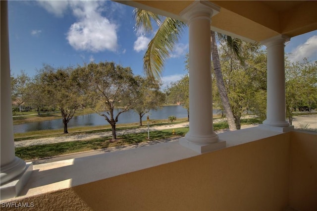 view of patio / terrace with a water view