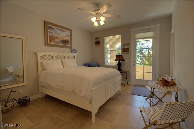 bedroom featuring access to exterior, light tile patterned flooring, baseboards, and a ceiling fan