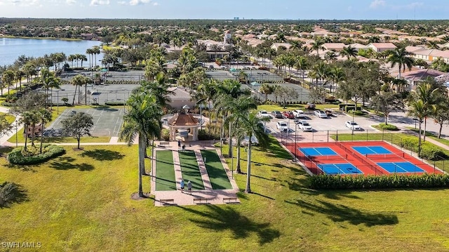 birds eye view of property featuring a water view