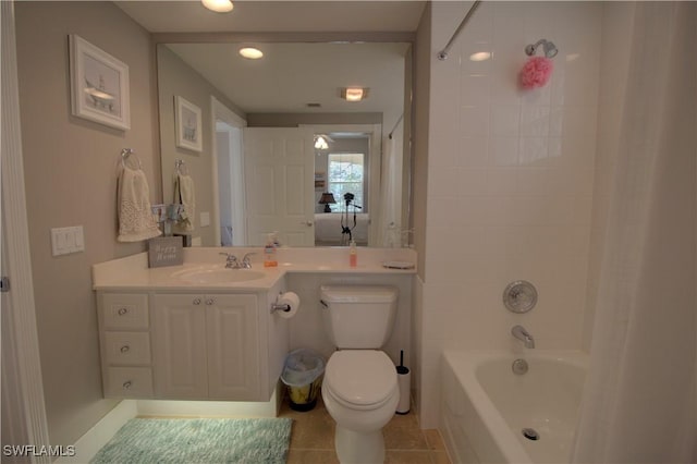 bathroom featuring shower / tub combo with curtain, vanity, toilet, and tile patterned floors