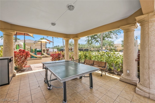 view of patio featuring a playground