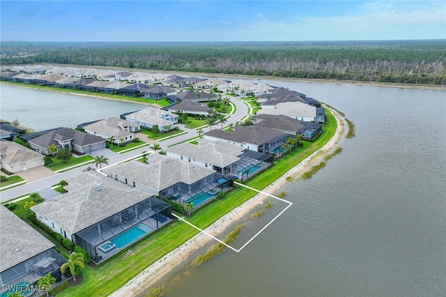 aerial view featuring a residential view and a water view