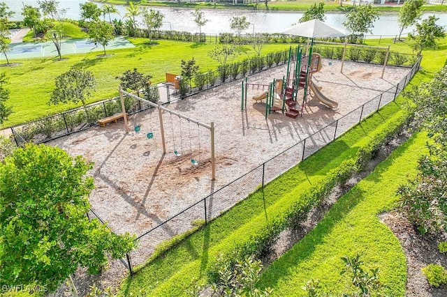 exterior space featuring playground community and fence