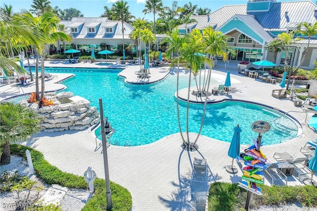 community pool with a patio