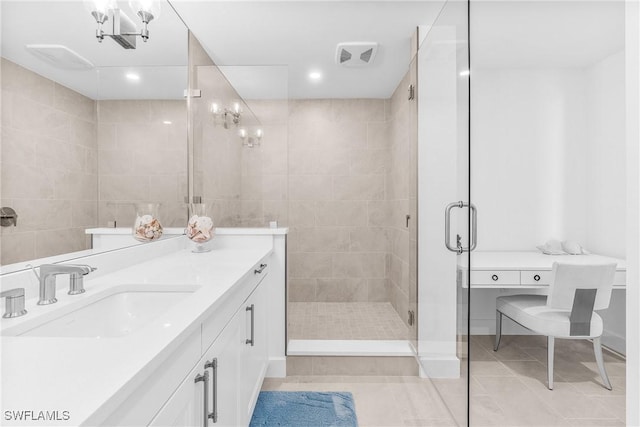 full bathroom with tile patterned flooring, a shower stall, vanity, and recessed lighting