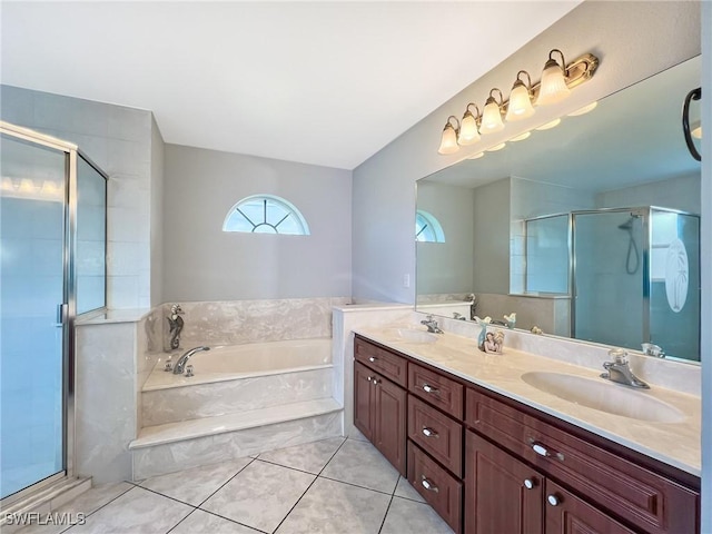 bathroom with tile patterned flooring, a sink, a shower stall, and a bath