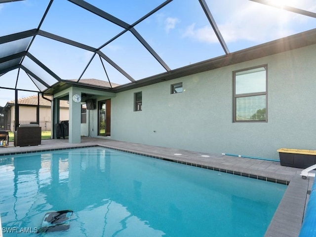 509 SW 8th Ct, Cape Coral, FL 33991 - outdoor pool featuring a patio area and glass enclosure