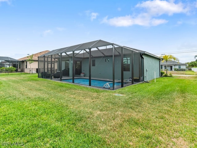 509 SW 8th Ct, Cape Coral, FL 33991 - back of property featuring an outdoor pool and a lanai