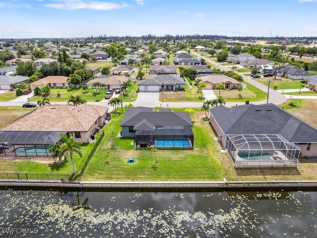 509 SW 8th Ct, Cape Coral, FL 33991 - aerial view of residential area featuring a nearby body of water and a pool area