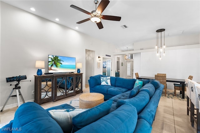 living area with light tile patterned floors, baseboards, visible vents, a ceiling fan, and recessed lighting