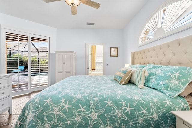 bedroom with access to exterior, ceiling fan, visible vents, and wood finished floors