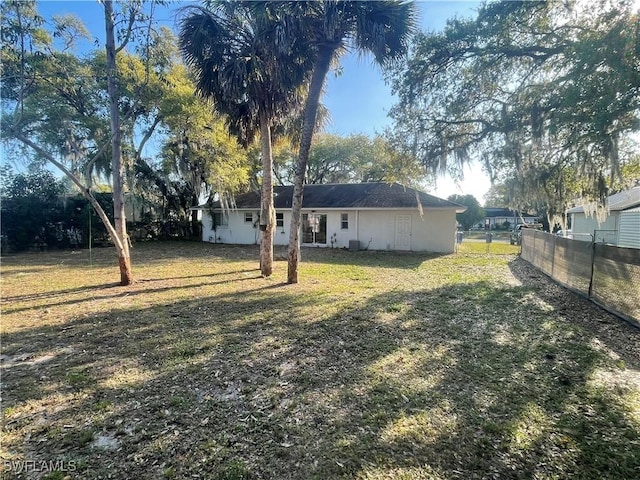 view of yard featuring fence