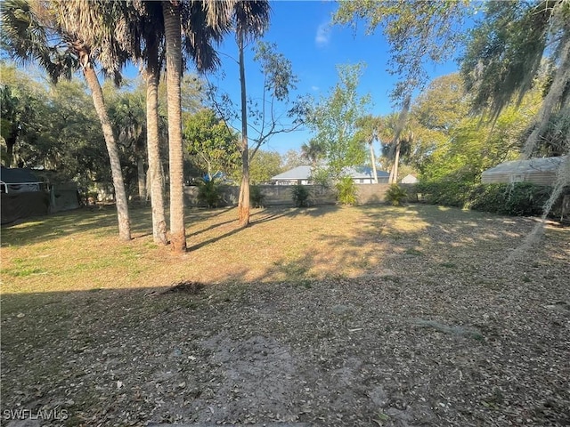 view of yard featuring fence