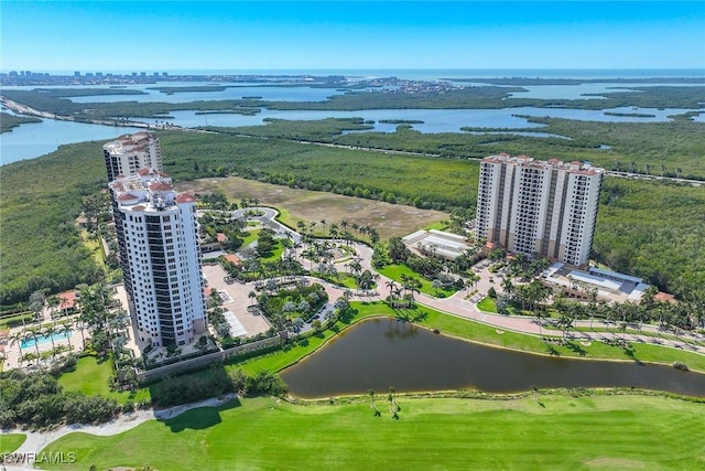 birds eye view of property with a view of city and a water view