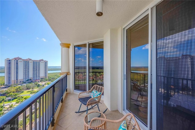 balcony featuring a city view