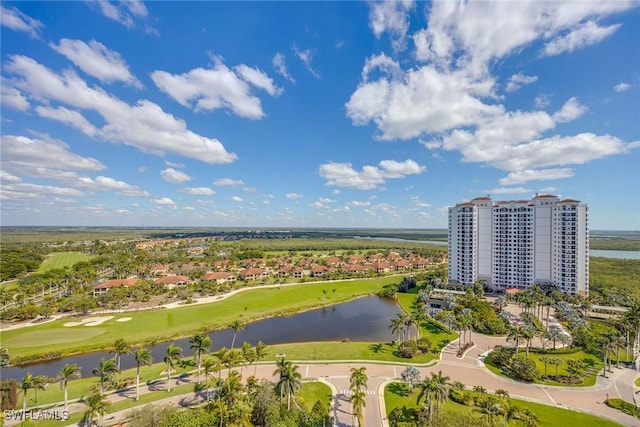 aerial view with view of golf course and a water view