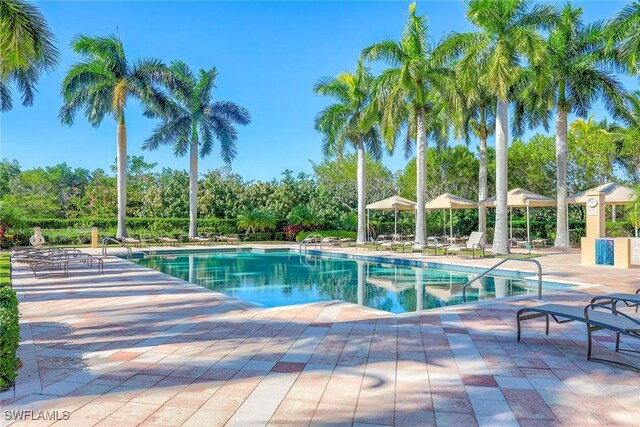 community pool with a patio