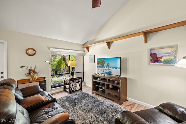 1861 Crystal Dr Unit 16, Fort Myers, FL 33907 - living area with wood finished floors, baseboards, lofted ceiling, and ceiling fan