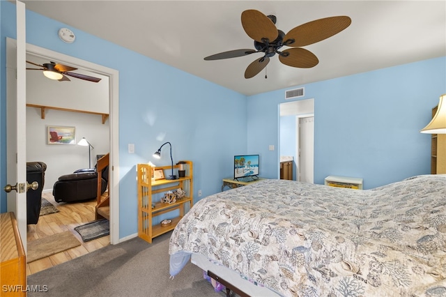 bedroom with visible vents and ceiling fan