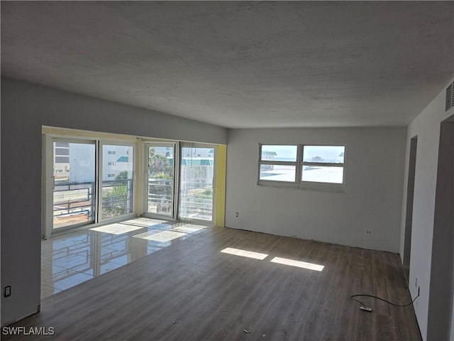 unfurnished room featuring wood finished floors